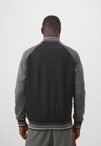 Umbro MONOGRAM ANTHEM JACKET - Treniņjaka - black/iron gate