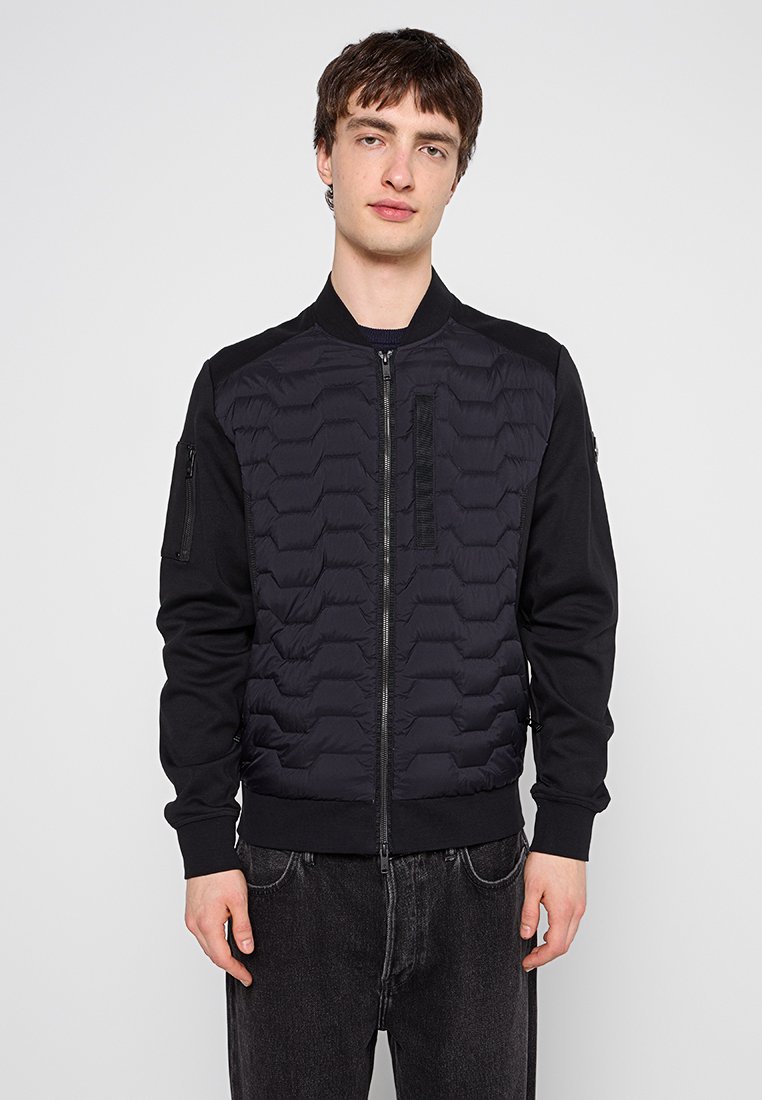 Moose Knuckles Gewatteerde jas zwart Moose Knuckles Gewatteerde jas zwart