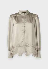 Wybrany, plaza taupe