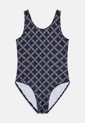 Maillot de bain une pièce marine avec un motif géométrique blanc en formes de diamant. Fabriqué en tissu lisse avec des bretelles larges et un dos plongeant.