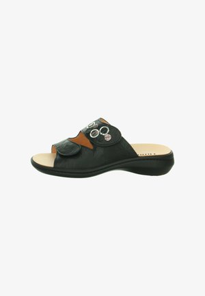 Black slide sandal featuring a textured upper with decorative round accents, a peep toe, and a lightweight, contoured sole.