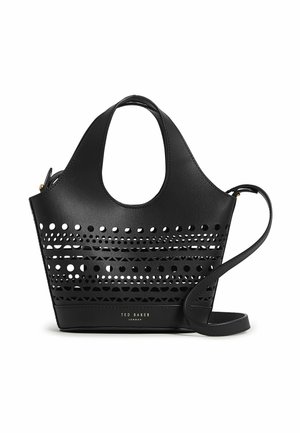 Schwarze Lederhandtasche von Ted Baker mit ausgeschnittenen kreis- und dreieckförmigen Mustern, rundem Griff und abnehmbarem Schulterriemen.