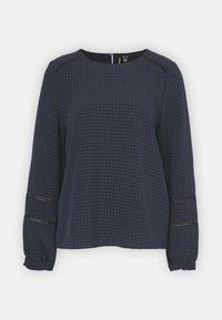 Navy blue long-sleeve blouse with checkered pattern, round neckline, and sheer lace accents on the sleeves. Soft fabric with textured finish.