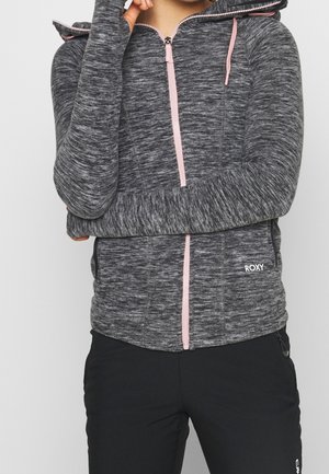 Gray knit zip-up hoodie with pink zipper and drawstrings, long sleeves, and fitted design. Logo displayed on the lower front.