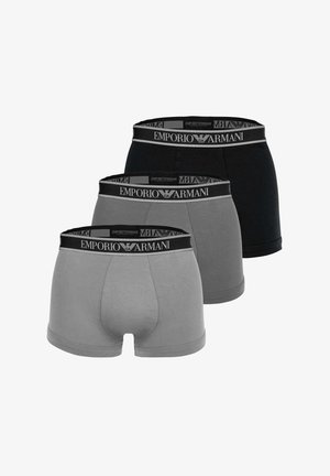 Trois boxers pour hommes en noir et deux nuances de gris, chacun avec une ceinture noire ornée du logo Emporio Armani en blanc.