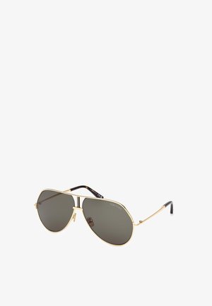 Ochelari de soare tip aviator cu ramă din metal auriu, lentile gri și vârfuri ale brațelor cu model țestoasă. Include logo pe lentila stângă.