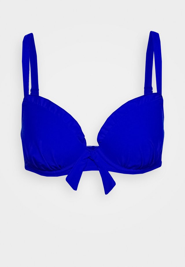 Coverage Jean Bikinisaet Stroplos