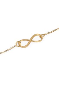 Pulsera de cadena de oro con diseño de símbolo de infinito. Textura suave con un acabado pulido. Enlaces delicados, construcción ligera.