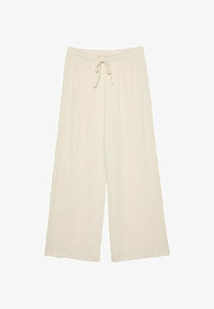 Wide-leg pants in a soft, textured cream fabric, featuring an elastic waistband with a drawstring for adjustable fit.