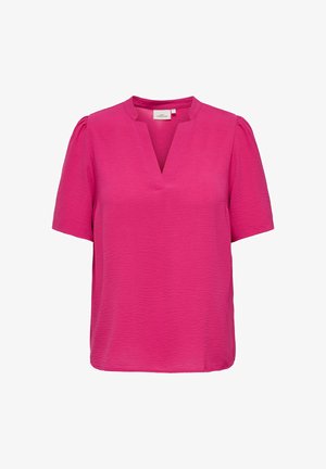 Kirkkaan vaaleanpunainen lyhythihainen pusero, jossa on teksturoitu kangas ja V-muotoinen lovellinen pääntie.