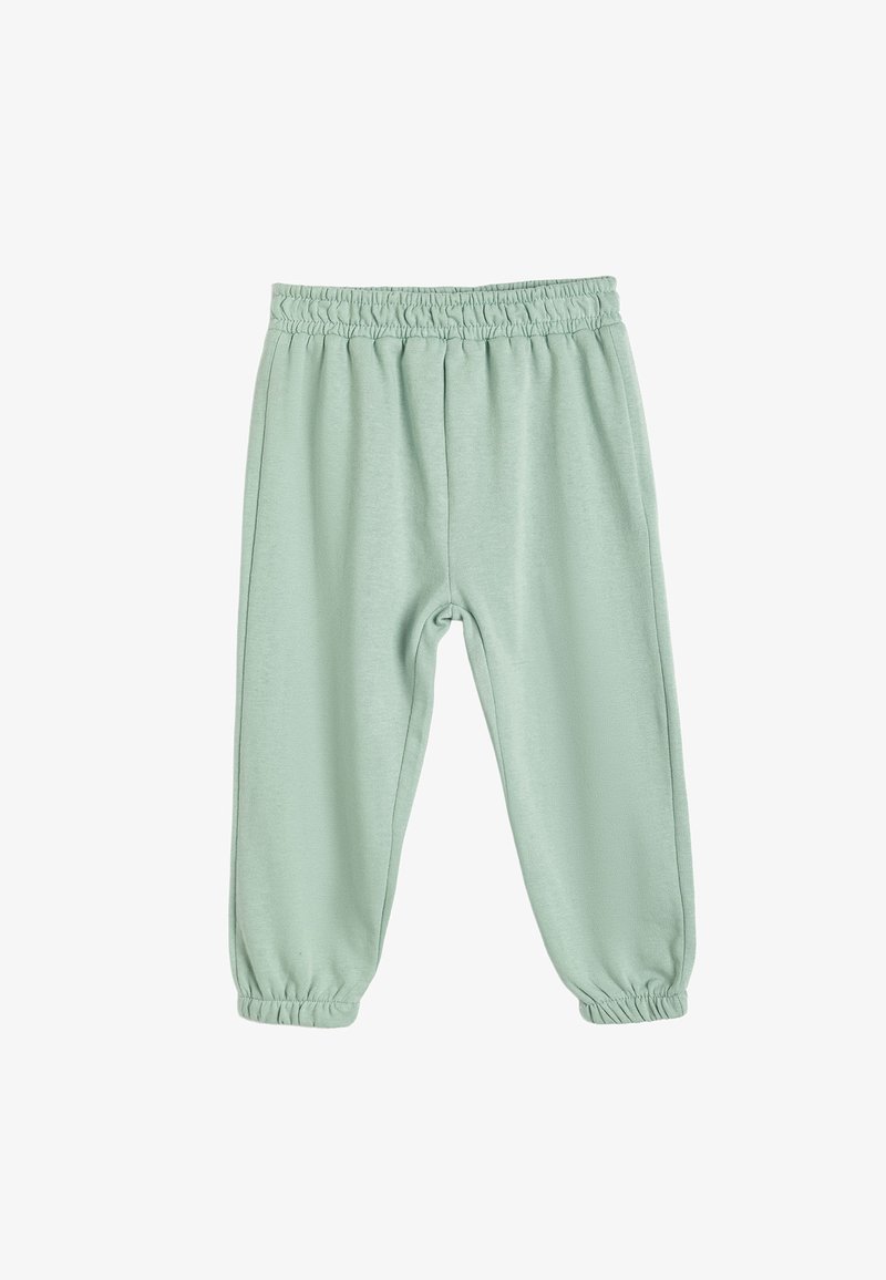 Lysgrønne sweatpants med elastisk talje og manchetter, med en afslappet pasform, præsenteret mod en simpel hvid baggrund.
