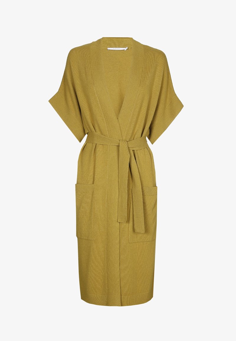 Senapsgul stickad morgenrock med vida ärmar, ett bälte vid midjan och två framfickor. Texturerad tyg med en slät finish.