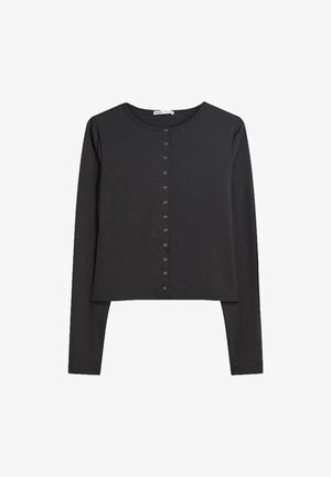 Black long-sleeve top in soft fabric, featuring a cropped design and rounded neckline. Front button closure with silver-tone buttons.