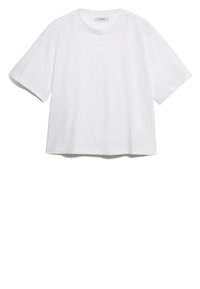 Camiseta de algodón blanca de manga corta con cuello redondo, corte holgado y diseño minimalista. Textura suave y longitud ligeramente recortada.