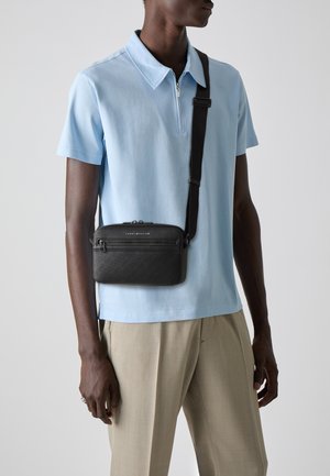 Tommy Hilfiger MONOGRAM REPORTER UNISEX - Sac bandoulière - black