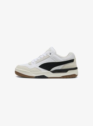 White and black athletic sneaker featuring a suede and synthetic upper, lace closure, padded collar, and gum rubber outsole.