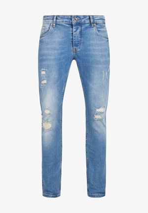 Világoskék, koptatott slim fit farmernadrág, elől szakadt részekkel, klasszikus öt zsebes kialakítással, cipzáros, gombos záródással.