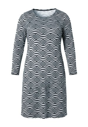 Černé a šedé šaty s dlouhým rukávem zobrazující cikcak vzor, kulatý výstřih a volný střih, vyrobené z jemné, pružné látky.