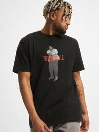Black cotton t-shirt featuring a large graphic of The Notorious B.I.G. in gray, with red text below and a relaxed fit.