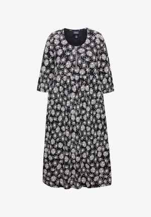 Kukkakuosiset mekko mustalla taustalla, valkoisia kukkia, pyöreä kaulus ja kolmannes hihasta, etureunassa vetoketjuyksityiskohta.