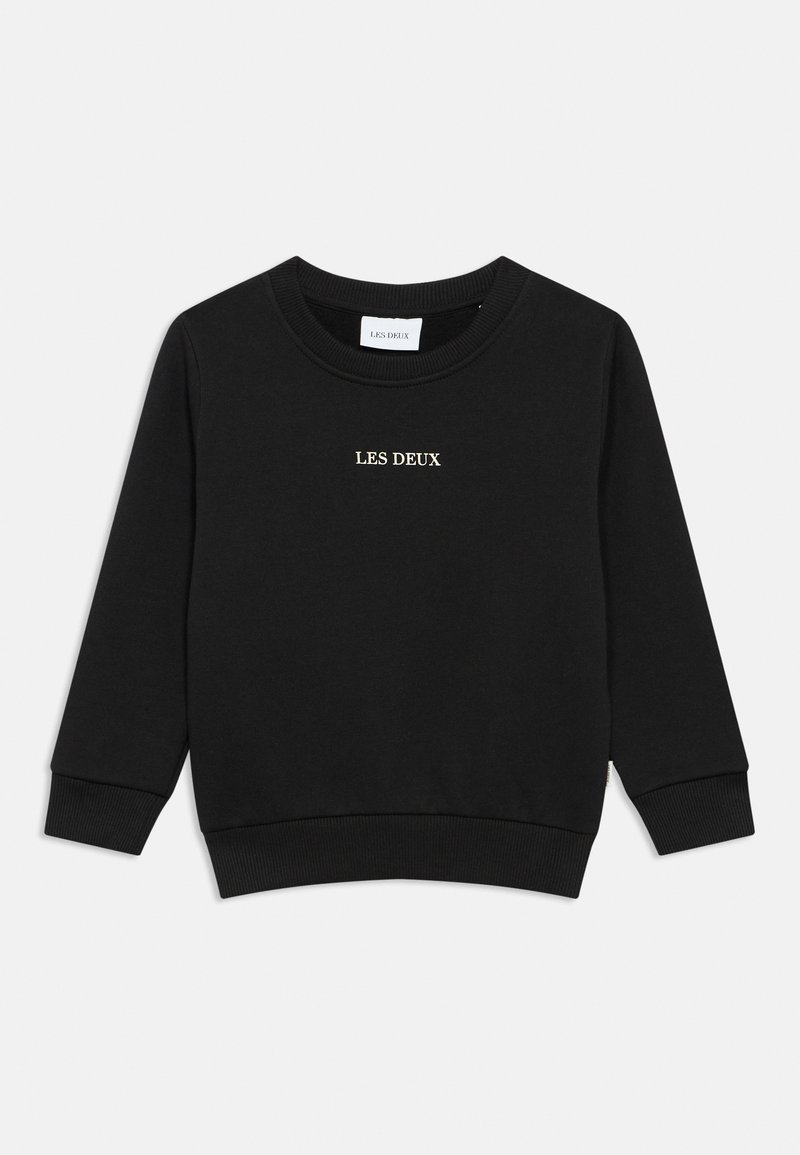 Sweat-shirt noir en tissu doux avec un col rond, des poignets et un ourlet côtelés. Présente le logo "LES DEUX" en doré sur le devant. Design classique.