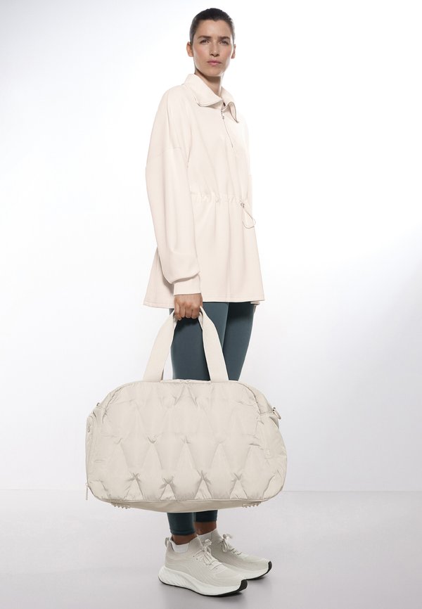 PADDED TECHNICAL - Reisetasche - beige