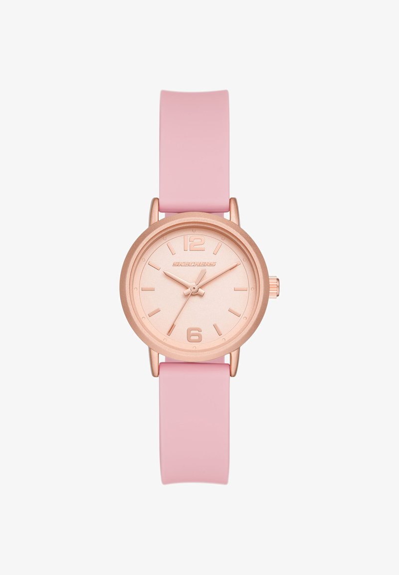 Orologio rotondo in oro rosa con cinturino in silicone rosa, quadrante minimalista con numeri 12 e 6 e tre lancette che segnano le 10:10:35.