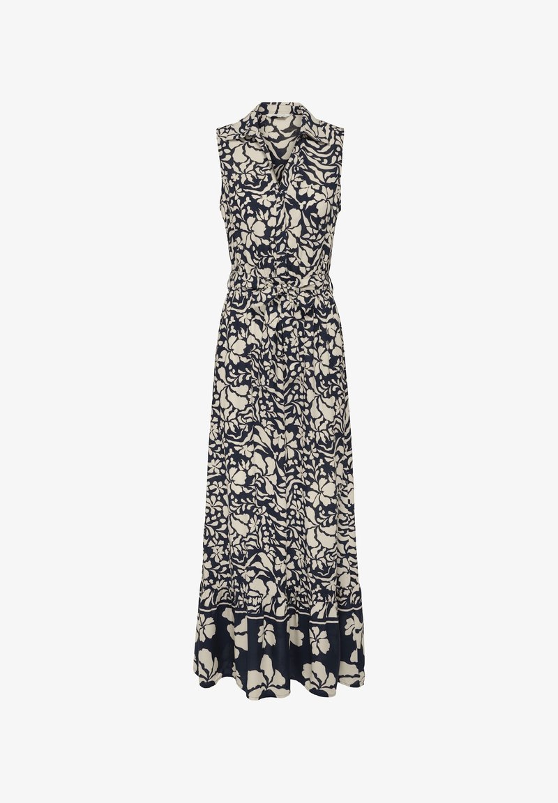 Robe longue sans manches avec col, taille cintrée et motif floral bleu marine et blanc sur l'ensemble du tissu.