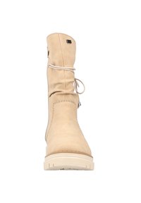 Botte en cuir beige jusqu'au genou avec un design décontracté, des lacets blancs, une fermeture éclair sur le côté et une semelle en caoutchouc texturée.