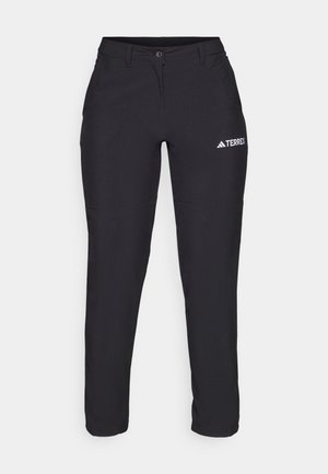 Pantalones exteriores negros hechos de una tela duradera. Diseñados con una forma ajustada, cuentan con un cierre de botón y un logo blanco en el muslo izquierdo.