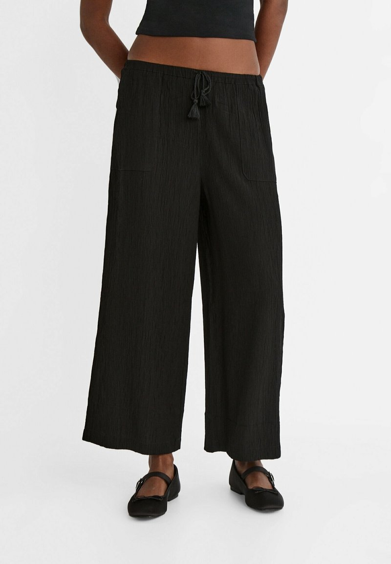 Stradivarius Trousers - black
