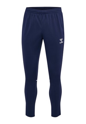 Granatowe sportowe spodnie o dopasowanym kroju z elastycznym pasem i białym logo hummel na prawym udzie, zaprojektowane do użytku sportowego.