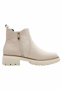 Bottine en cuir beige avec une fermeture éclair latérale et une languette, dotée d'une semelle épaisse blanche et de détails de couture subtils.