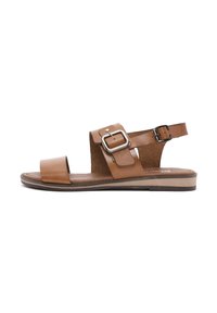 Brown leather sandals with a wide front strap and an ankle strap, featuring a metal buckle, cork insole, and flat rubber sole.