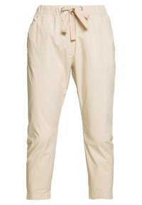 Pantalon léger beige avec une taille élastique et un cordon de serrage. Comprend deux poches latérales et un design de jambe effilée.