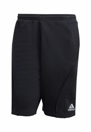 Juodos sportinės šortai, pagaminti iš lygaus audinio, su elastinga juosmens juosta, šoninėmis siūlėmis ir mažuoju baltu logotipu apatinėje dešinėje.