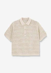 Beige polo shirt met korte mouwen in open brei ontwerp, voorzien van drie knopen bij de kraag en geribde manchetten. Lichtgewicht, gemêleerd materiaal.