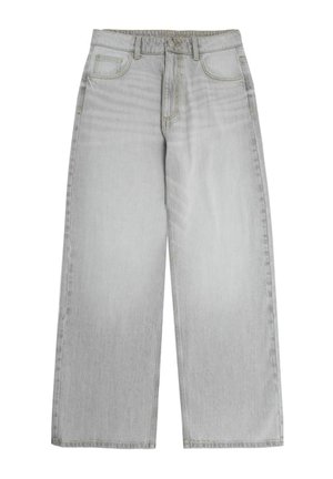 Lysegrå jeans med vide ben, forlommer, bæltestropper, knap- og lynlås, vist fladt på hvid baggrund.