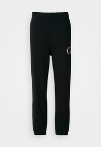 Μαύρες φόρμες από μαλακό μείγμα βαμβακιού, με ελαστική μέση και μανσέτες. Περιλαμβάνει μια μικρή λογότυπη λεπτομέρεια στο μηρό.