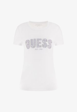 Witte katoenen t-shirt met korte mouwen, met een sprankelende "GUESS"-logo met rhinestones en "EST. 1981" eronder. Glad textuur, getailleerd ontwerp.