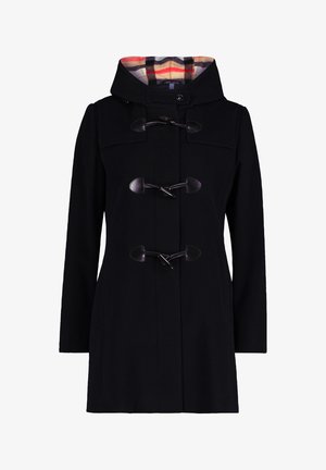 Zwarte duffelcoat met een capuchon, voorzien van leren accenten, toggle-sluitingen en een geruite voering in rood, wit en zwart.