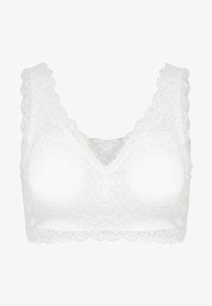 Biała koronkowa braletka z falbaniastym wykończeniem, z dekoltem w kształcie litery V i wzorzystą teksturą. Miękkie, nieusztywniane miseczki dla komfortu i wsparcia.