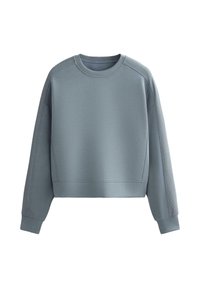 Kort sweatshirt i mjukt, dämpat blått tyg. Har långa ärmar, rund hals och ribbade detaljer vid axlarna och ärmsluten.