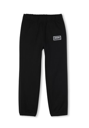 Pantalon de survêtement noir à taille élastique avec jambes droites, présentant un petit logo rectangulaire blanc Kenzo Paris sur la partie supérieure de la cuisse gauche.