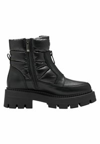 Bota de invierno con suela gruesa negra, parte superior acolchada, cremallera en el lado interior y asa de tirón en el talón.