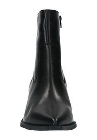 Bottines en cuir noir avec zip sur le côté, bout arrondi et semelle plate, présentées de face sur fond blanc.