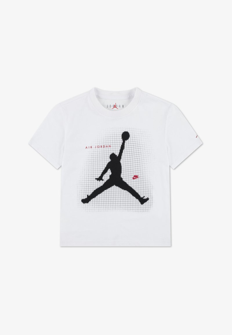 T-shirt en coton blanc avec une silhouette noire d'une figure sautante, texte "AIR JORDAN" en rouge, et un motif en grille derrière le graphique.