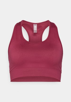 Burgundy sportbh med ett slätt, stretchigt tyg. Har en racerback-design och ett brett, stödjande band i botten.