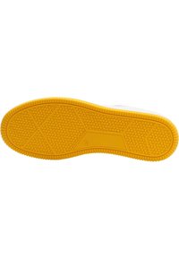 Rubber sole with textured hexagonal pattern, featuring a yellow color and contrasting white edges, designed for grip and durability.