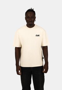 CRYSTAL PARIS OVERSIZED SHINE - T-shirt print - cream